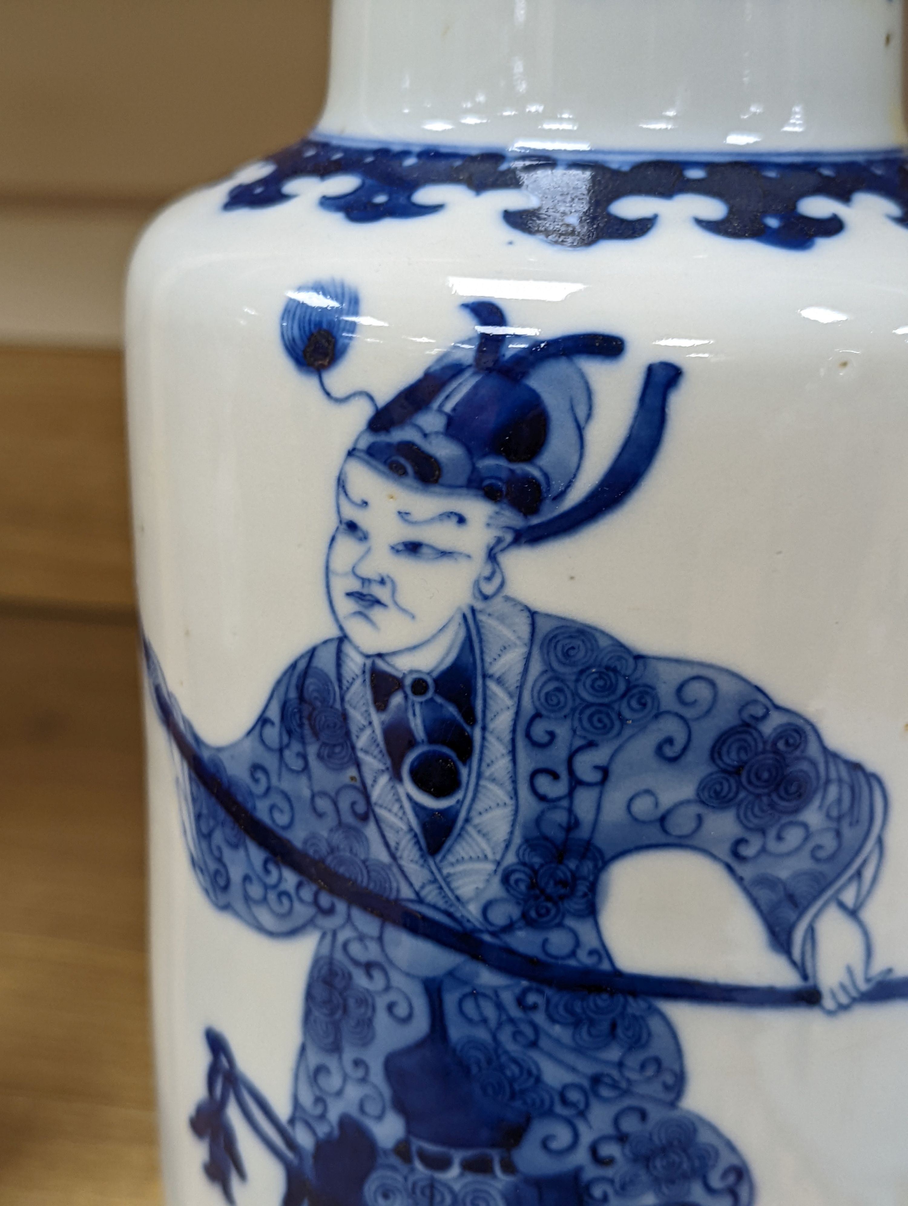 A Chinese blue and white rouleau vase, 35 cms.